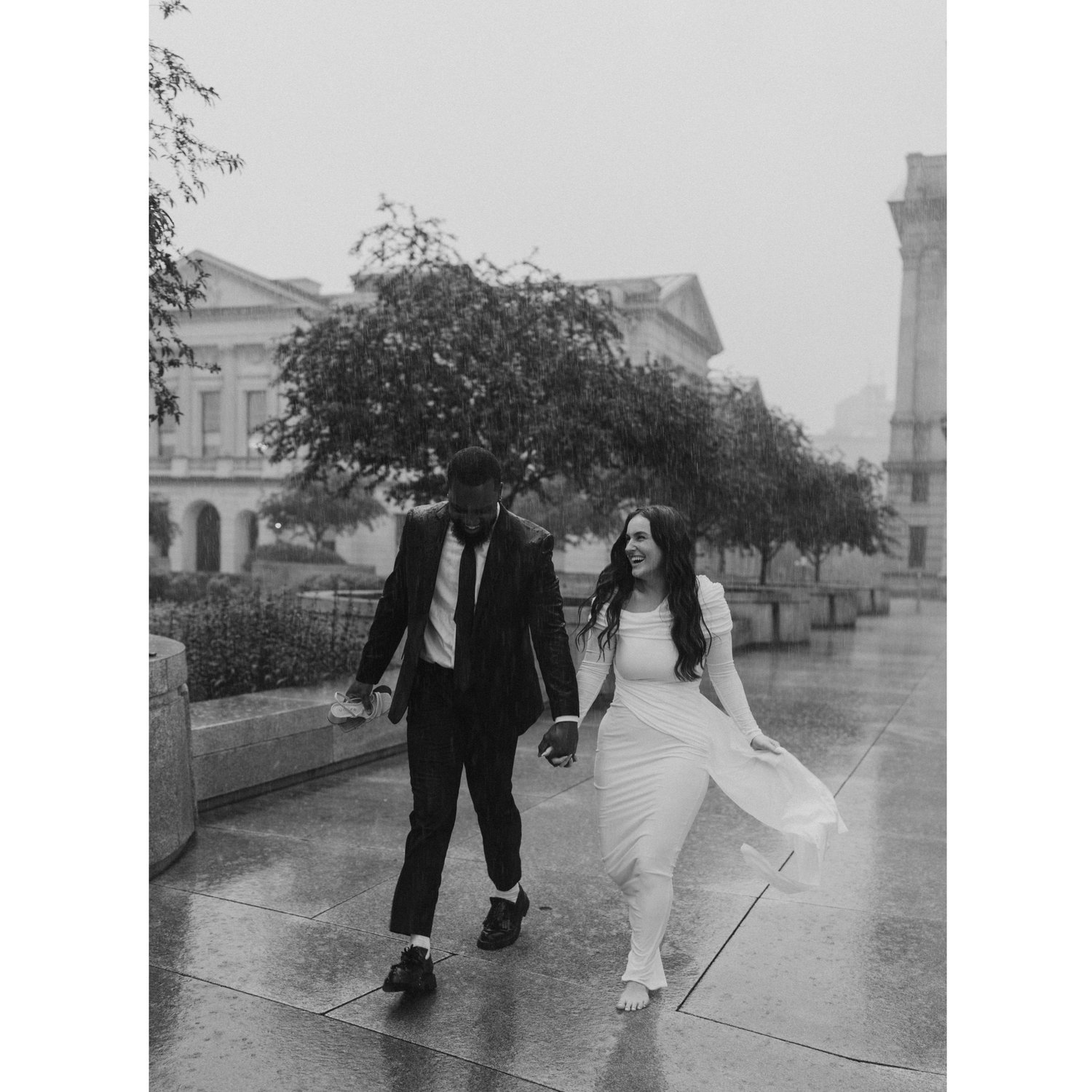 We loved this moment at the end of our engagement shoot when it started pouring rain!