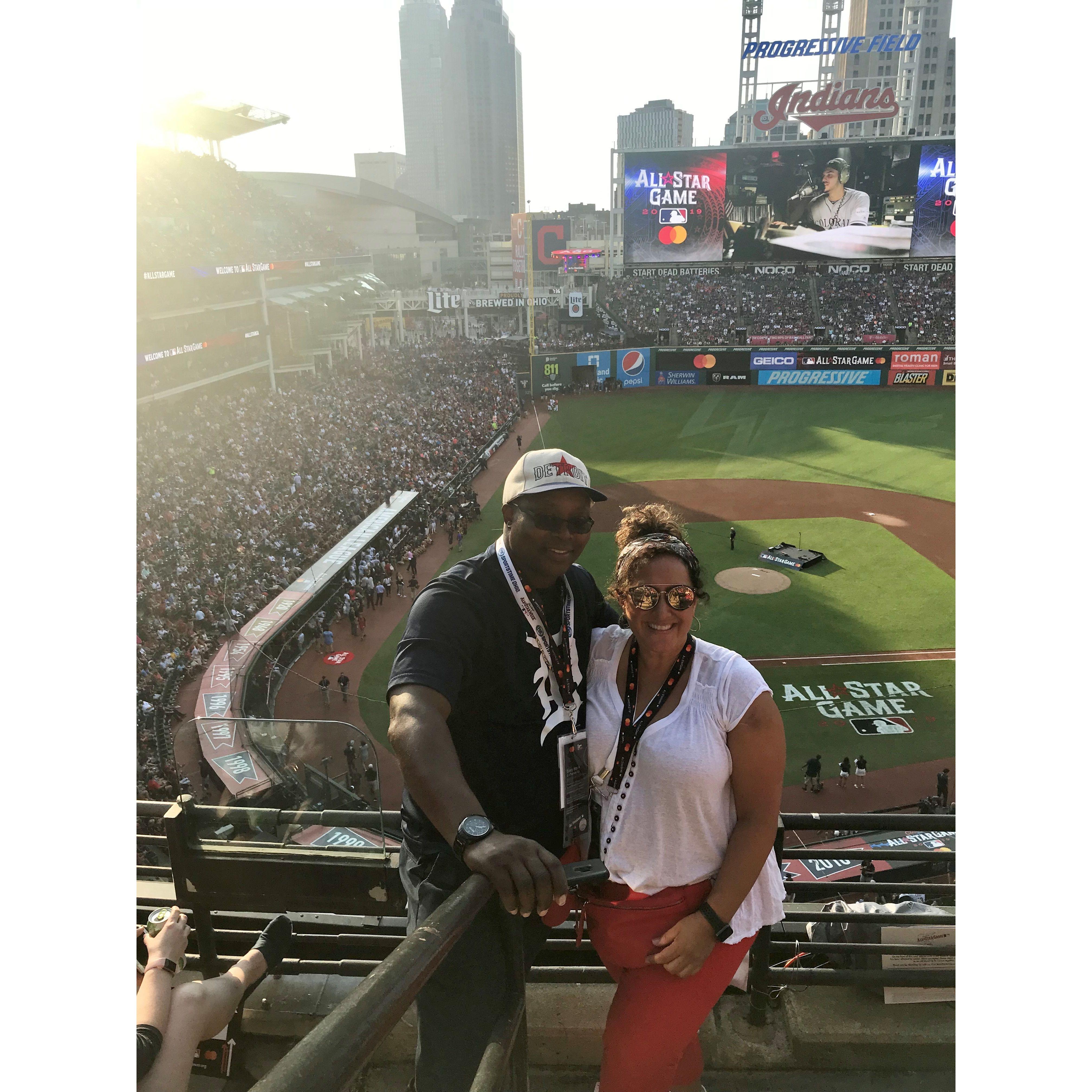 Denise is a huge baseball fan.  Tim is not but he attends endless games with her.  It must be love.