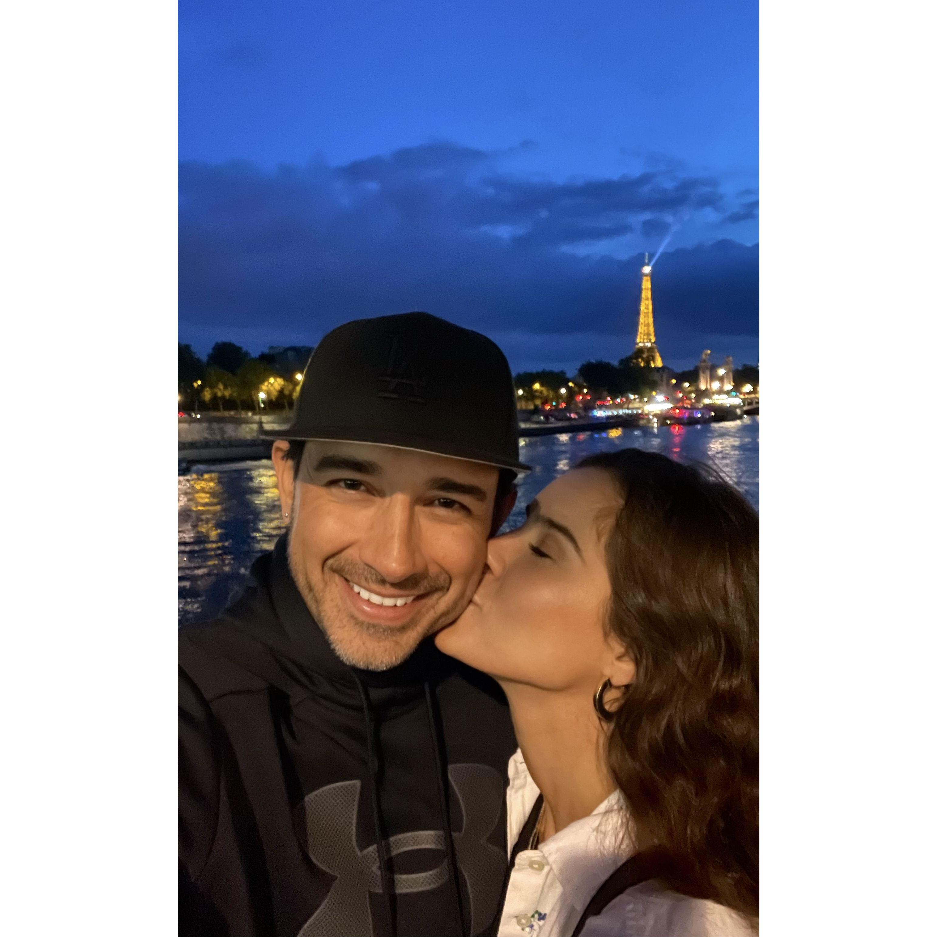 Kisses in front of the Eiffel Tower in Paris this summer
