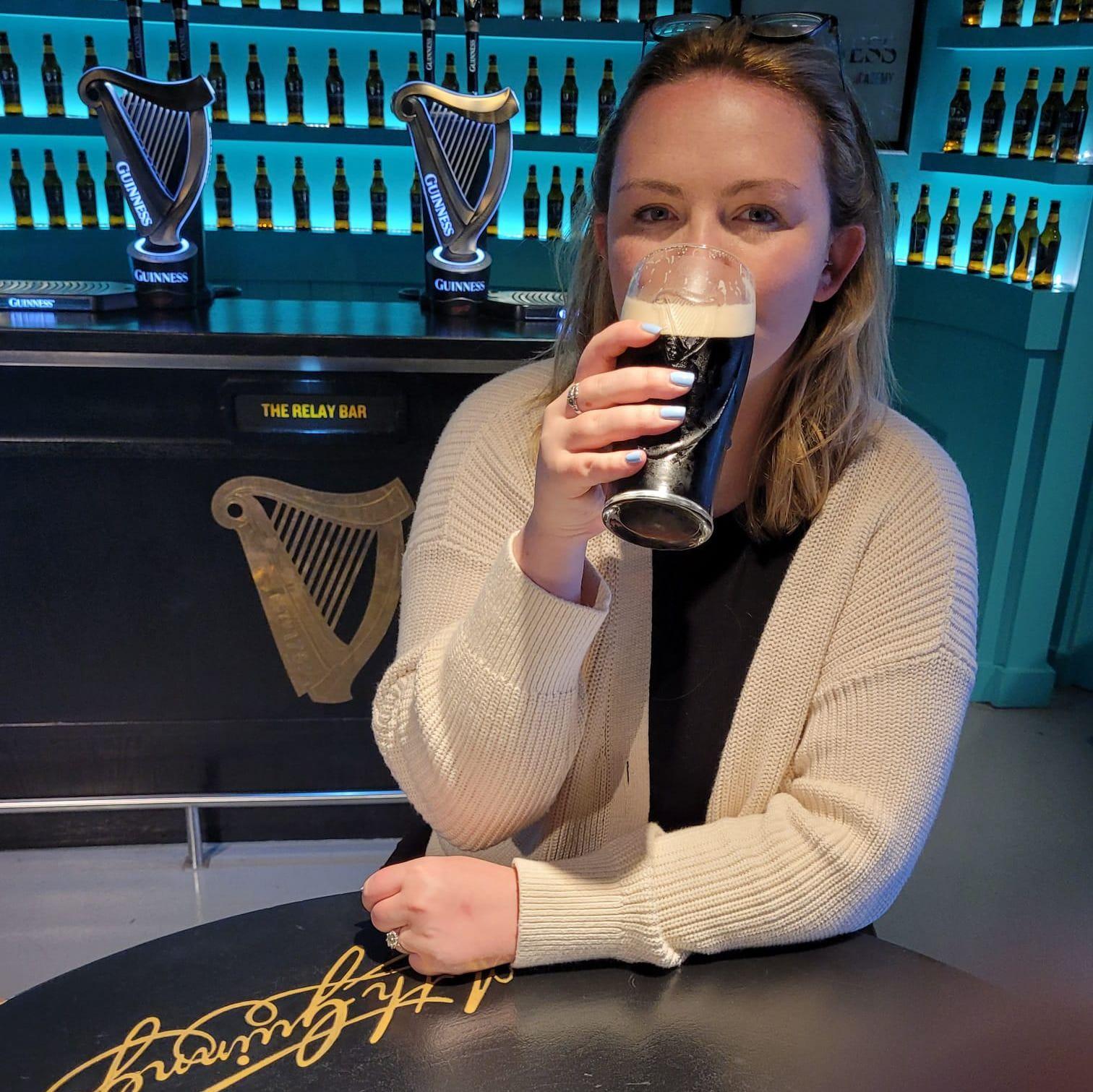 A beautiful woman drinking a beautiful pint (Guinness Factory, 2024)