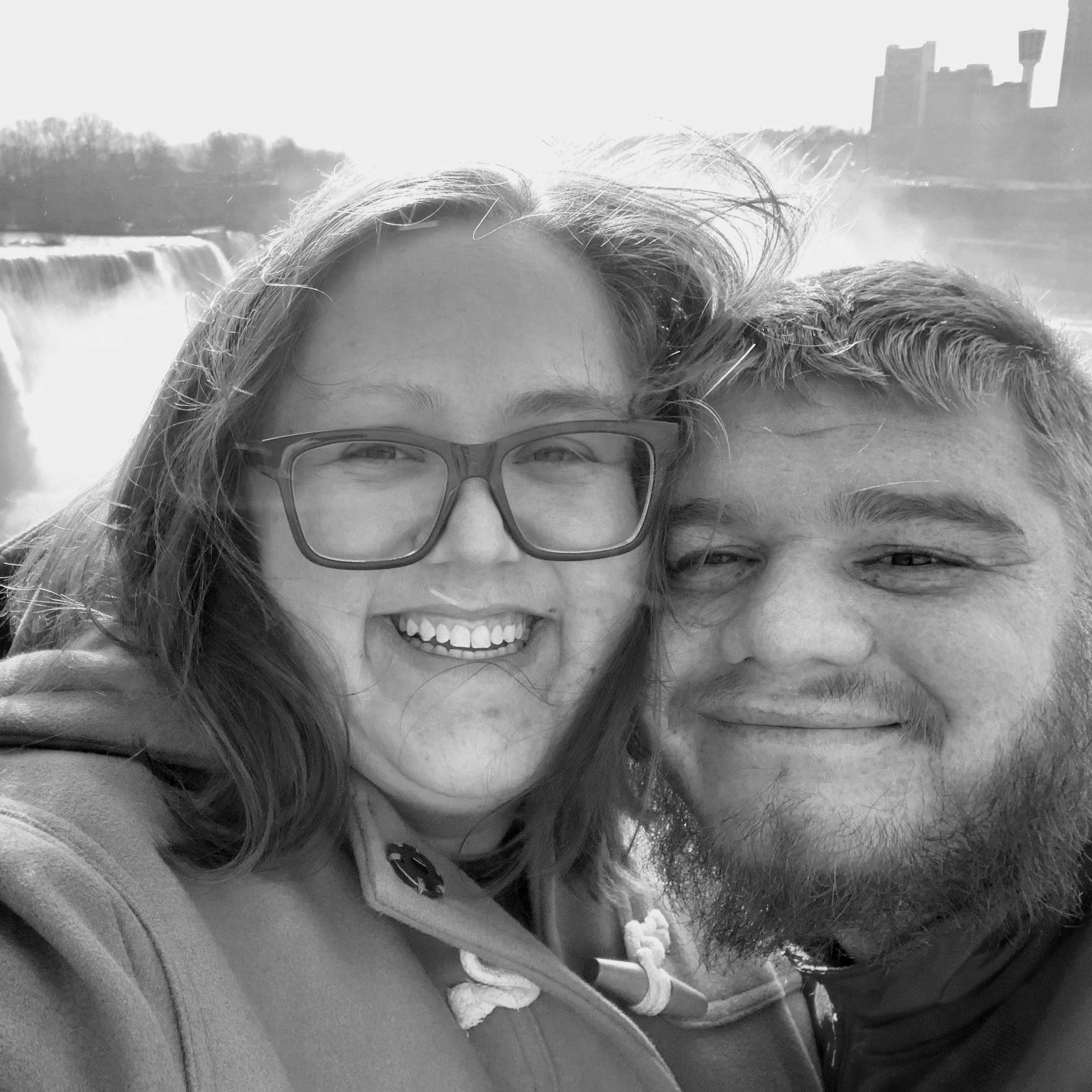 Don't mind our crazy hair, we had been in the car for a long time. Here we are standing at Niagra Falls , a stopping point on our way back from visiting my parents for Christmas in 2019.
