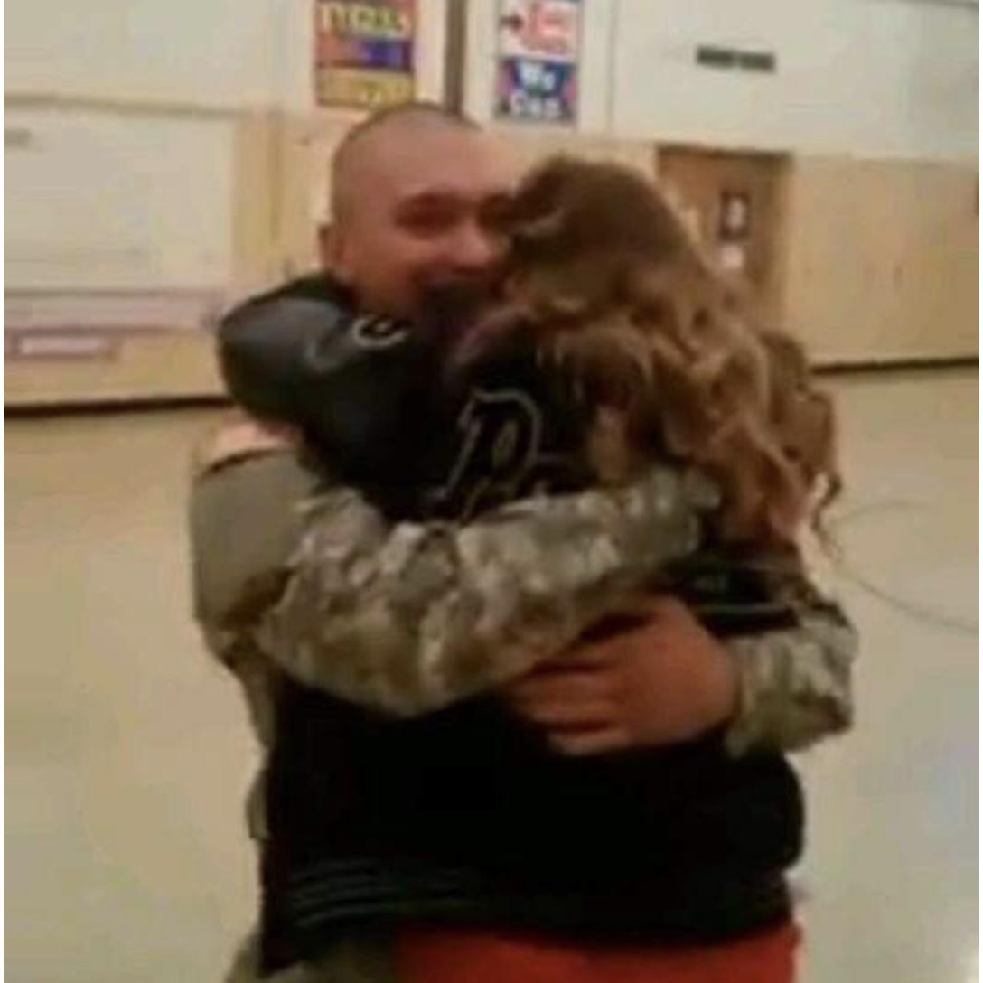 Aaron Surprising Sam for a Christmas Home from Basic