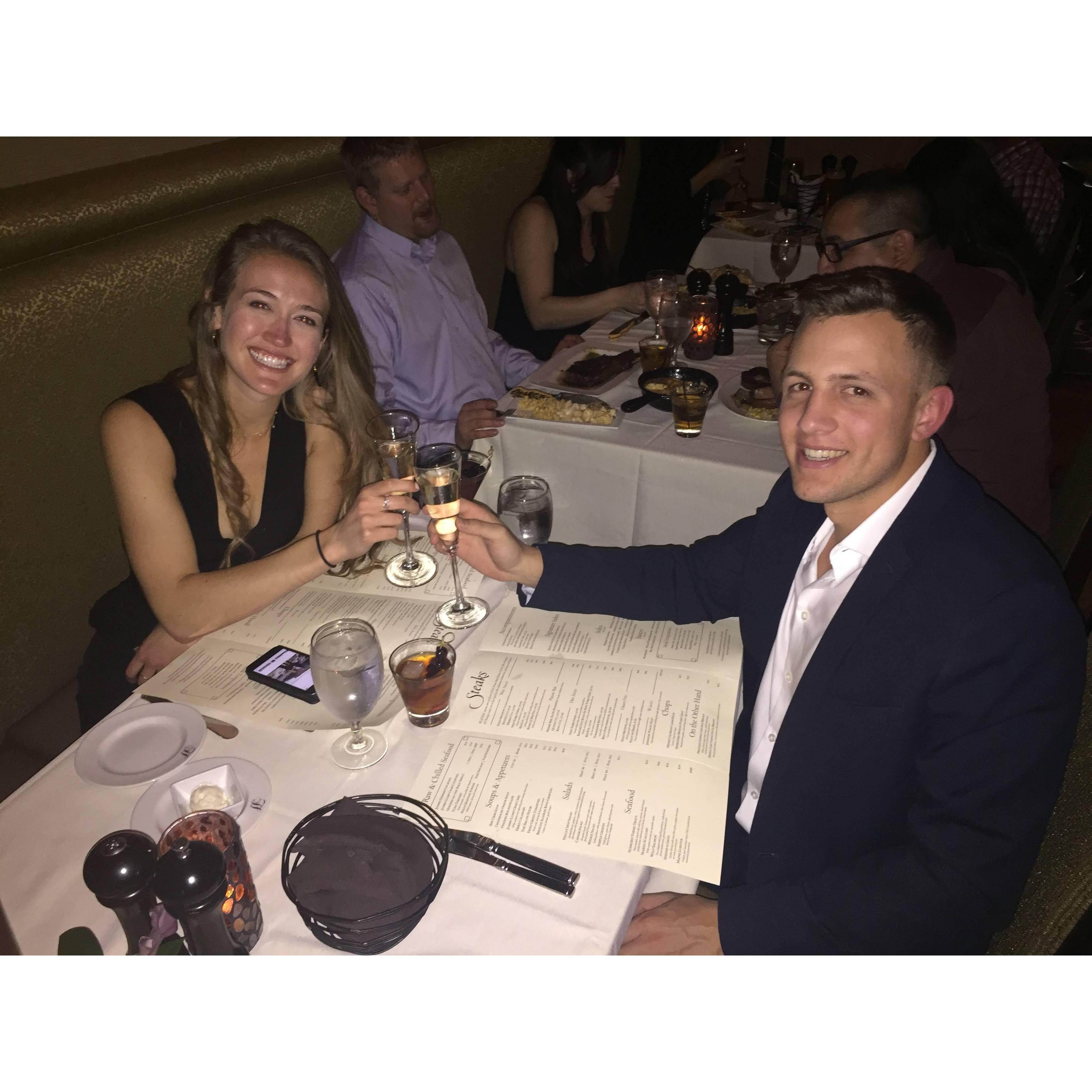 Celebrating a month of dating (we may have told them a year and they brought us champagne)