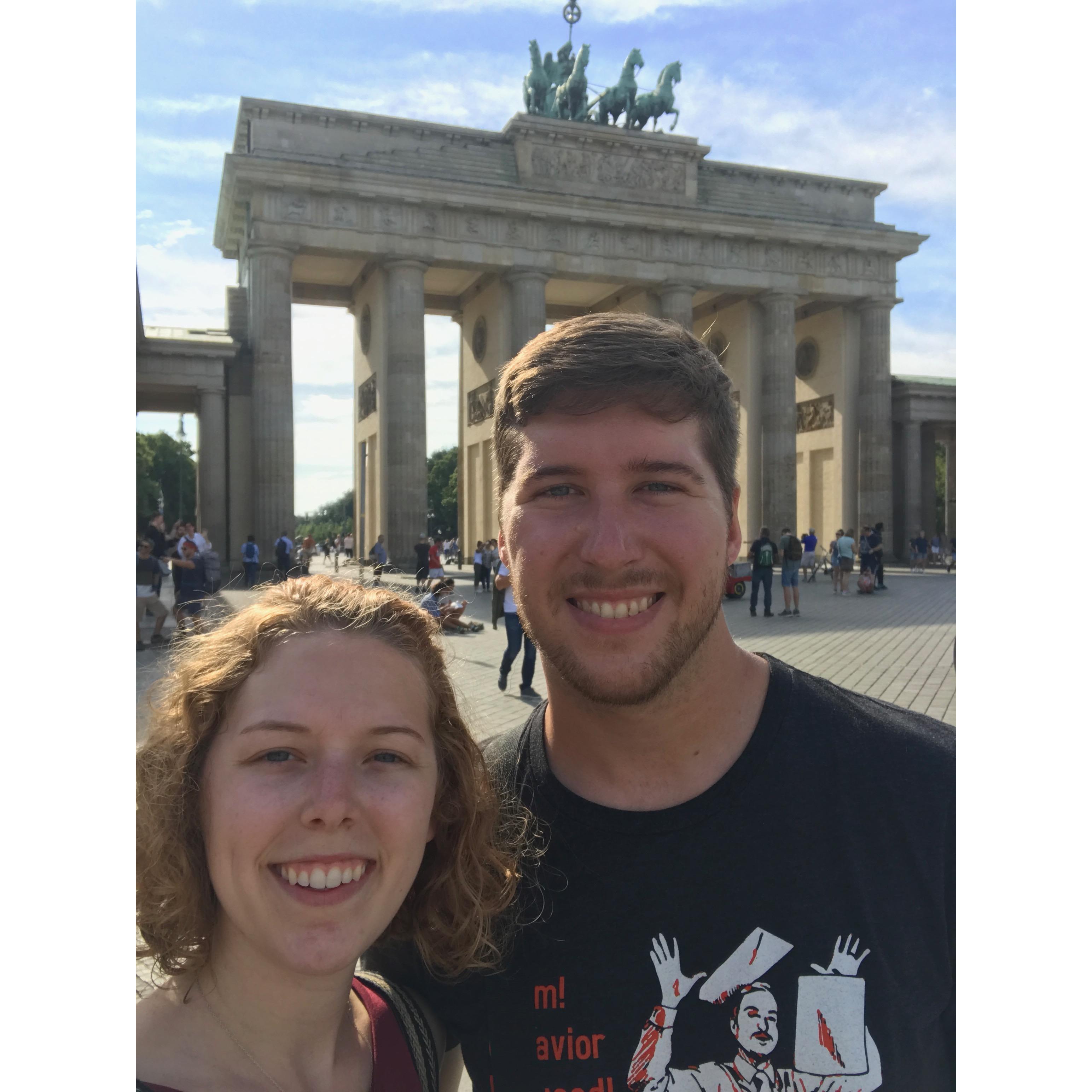 At the Brandenburg gate in Berlin, Germany.