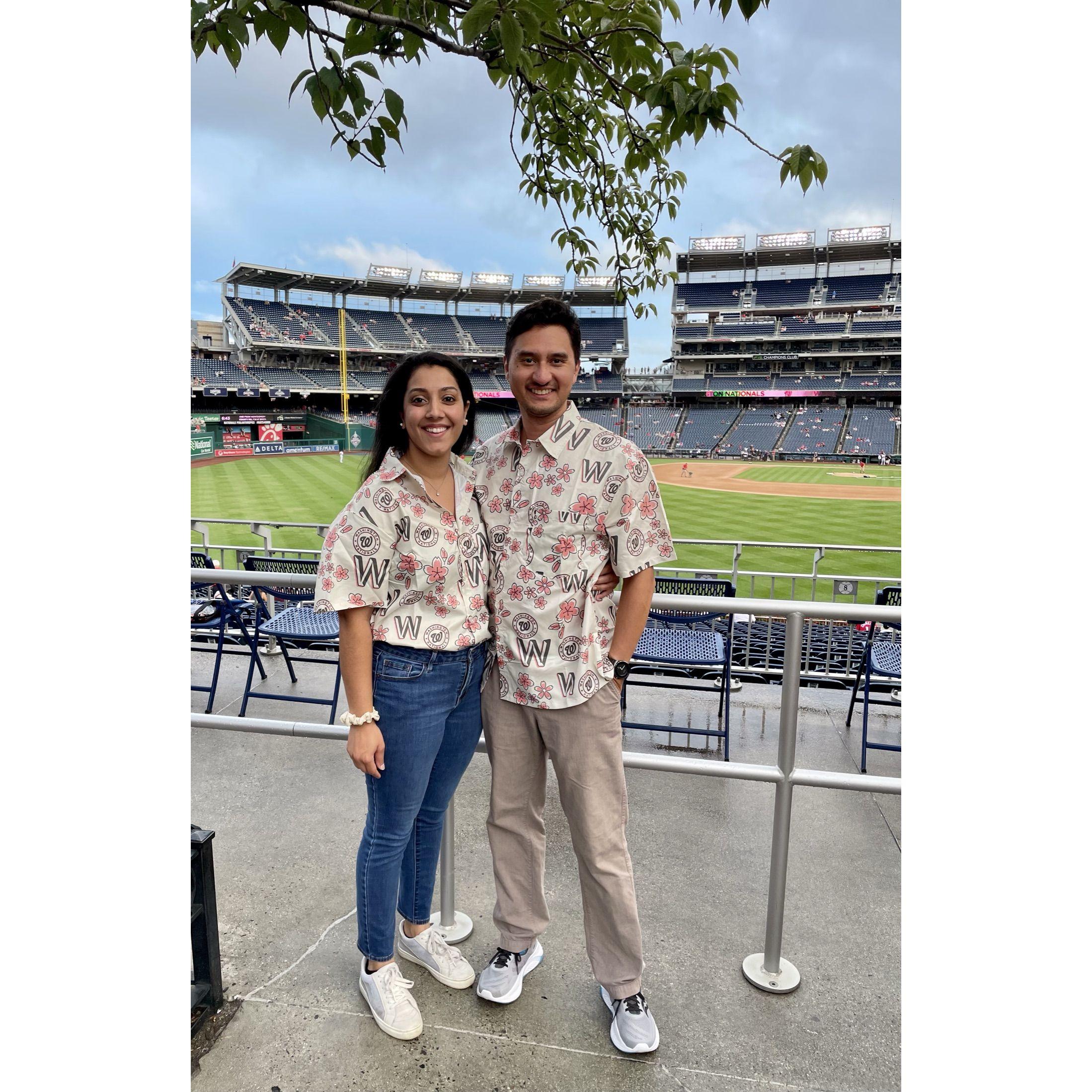 Our first of many baseball games together but perhaps (?) our last wearing cherry blossom giveaway shirts - Jessica's dad (but not her brother) approved of the dad shoes.