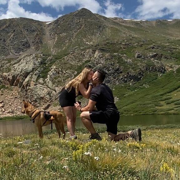 Hiking is our favorite activity to do together, so it's no surprise that Jordan popped the question on a mountain!