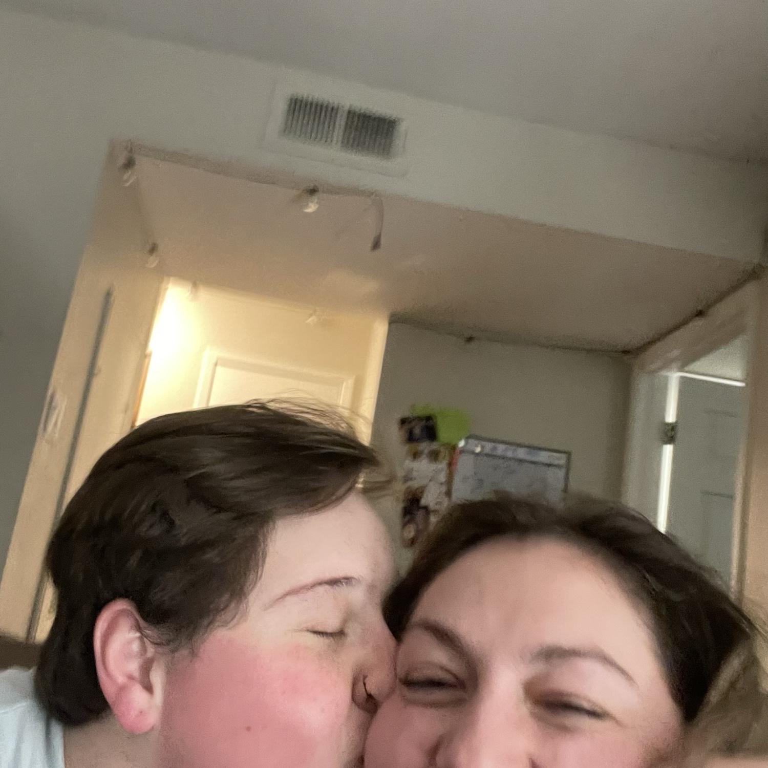 Giving my wife a smooch- Kelly