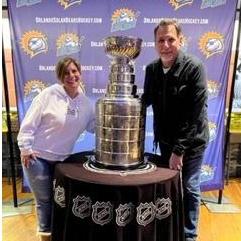 Solar Bears game posing with the Stanley Cup