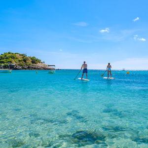Paddle boarding over the Great Barrier Reef