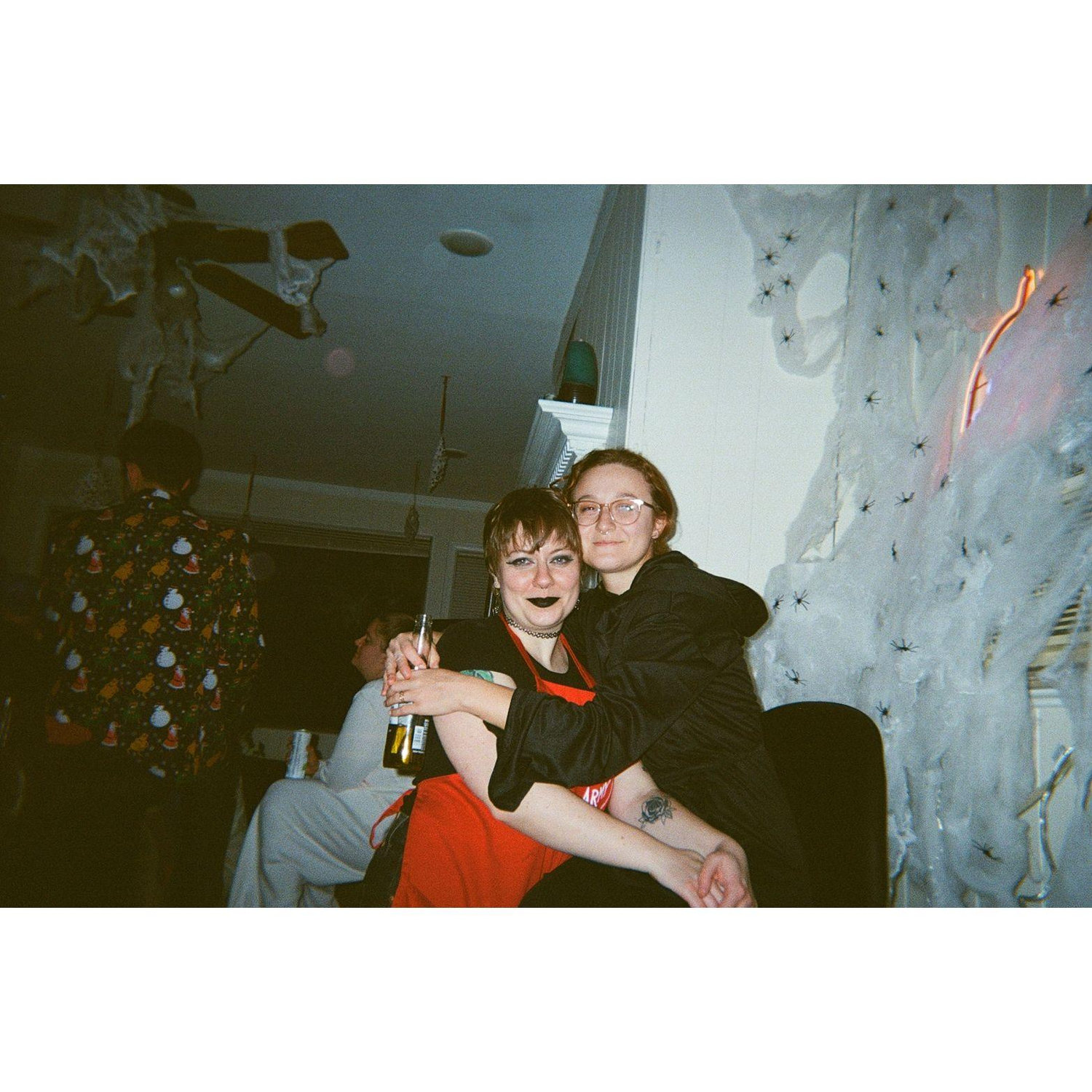 At our annual Nightmare Before Christmas party. Nora is the Ghost of Christmas Future and Sam is a Damnation Army bellringer.