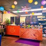 Get food/coffee at the Orange Cat Cafe in Farmington