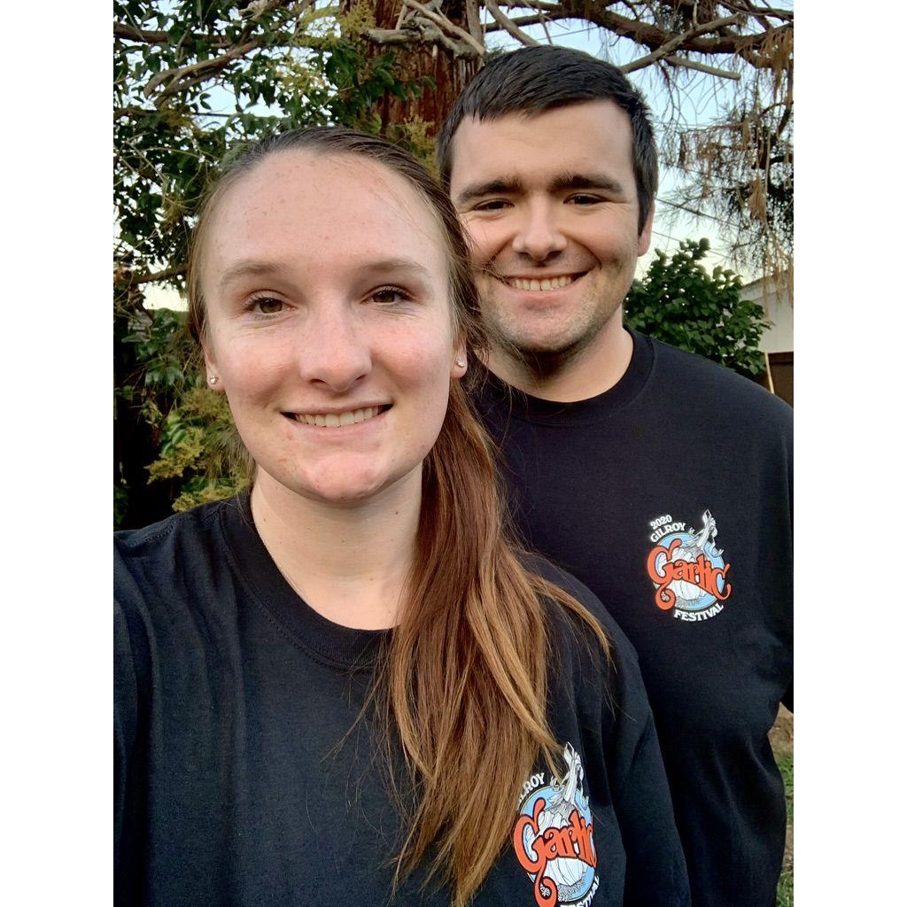 The back of the shirts say "Covid Stinks"