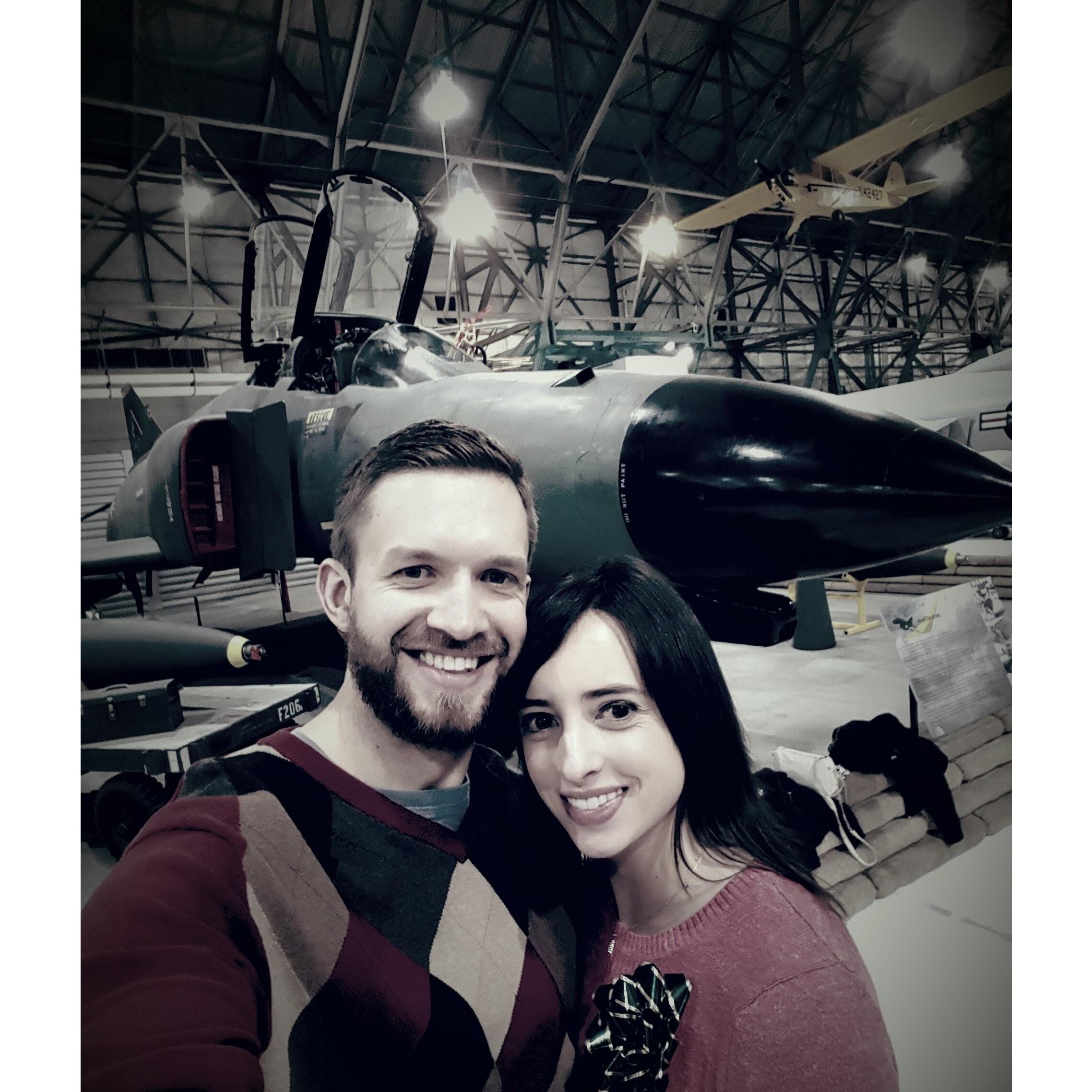 Super awesome ugly sweaters at a beer festival inside an airplane museum.