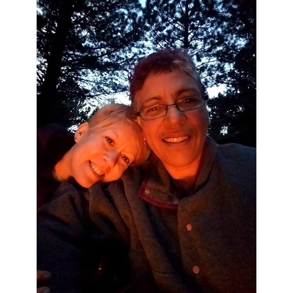 Snuggling by the camp fire while camping in Utah