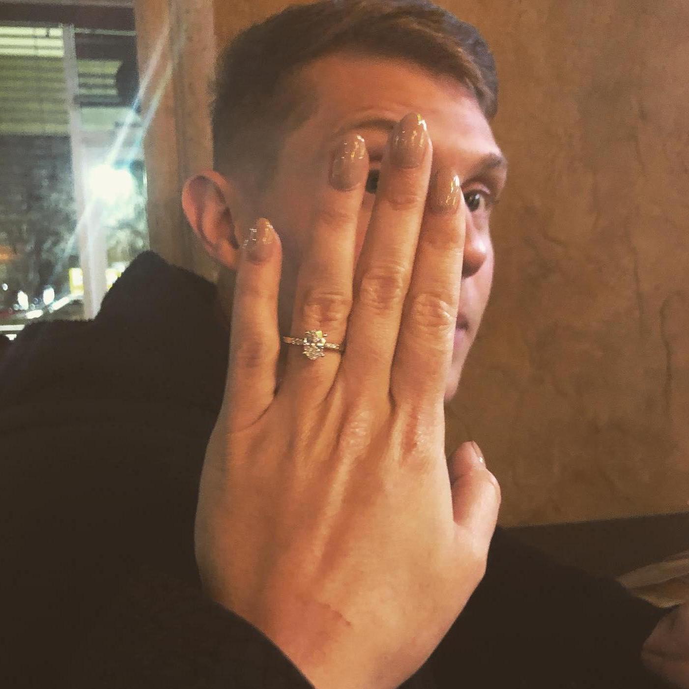 The engagement ring.