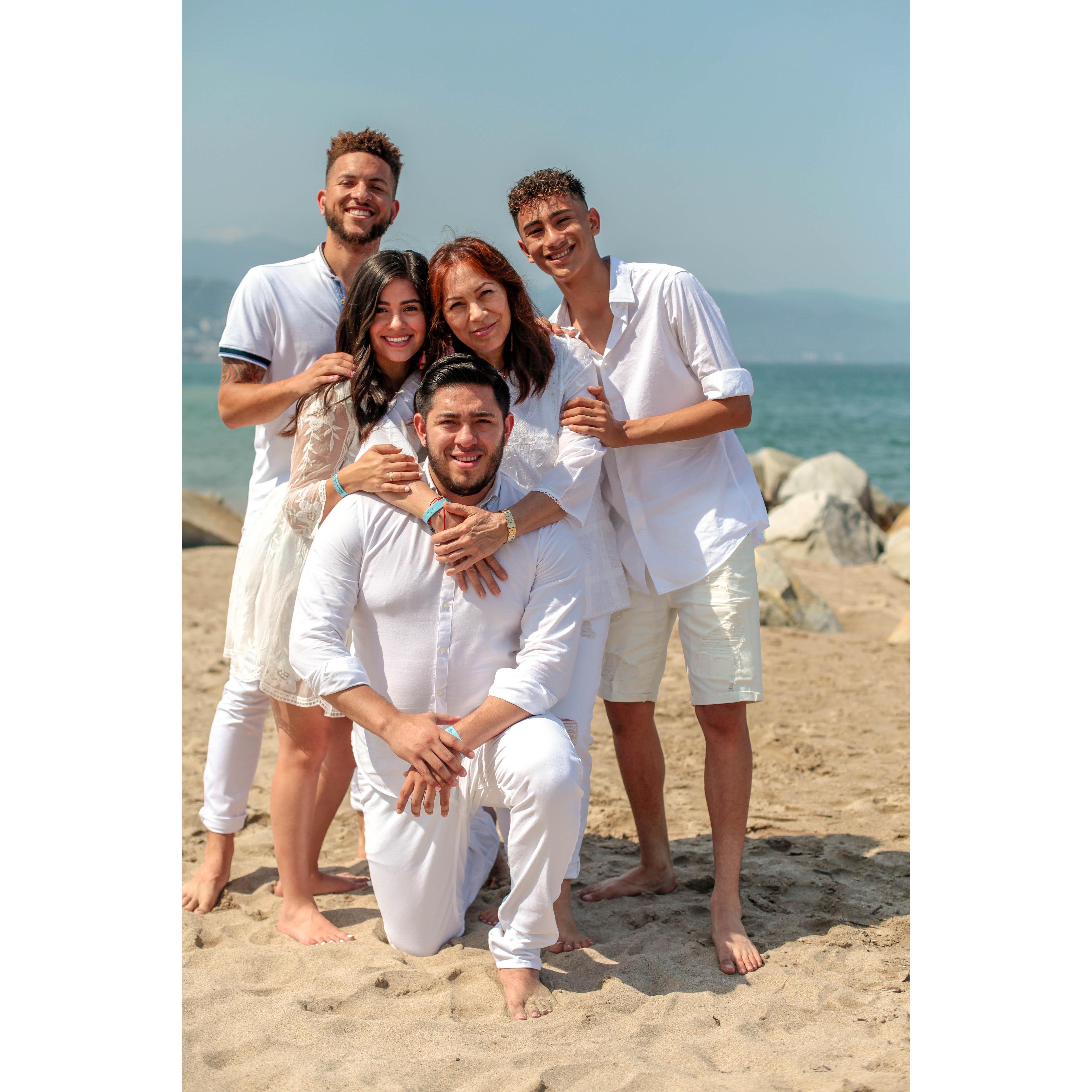 The reason we were here in the first place. In all white, by the beach...family photos that I planned.
