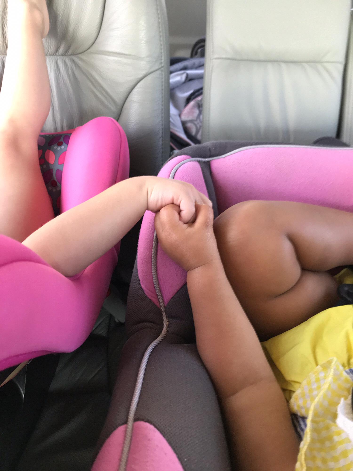 Awww... Holding hands just like Mommy and Daddy