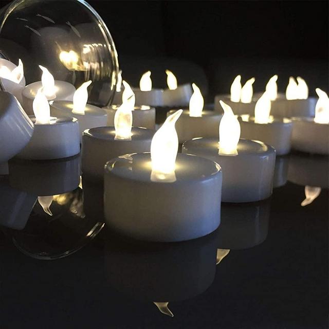 VETOUR Flameless Tea Lights Candles Realistic LED Flickering Operated Tea Lights Steady Battery Tealights Long Lasting Electric Fake Candles in White 24pcs Decoration for Party and Gifts Ideas