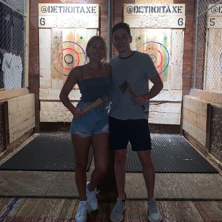One of our first dates as an official couple, Axe Throwing: August 2021