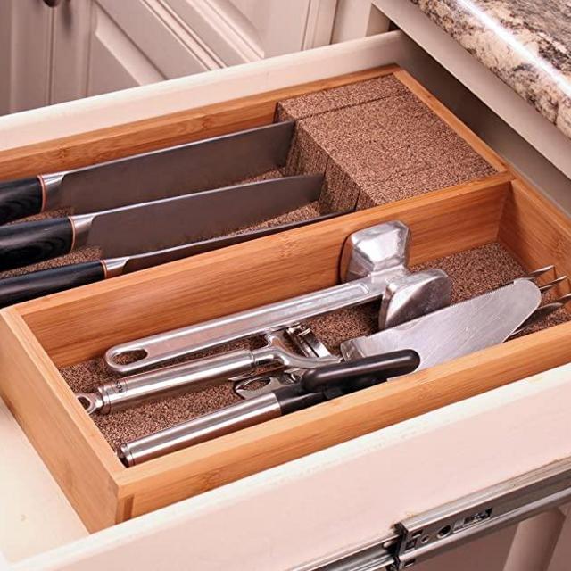 KnifeDock with Utensil Tray. Reorganize your cluttered kitchen drawers. The KNIFEdock with utensil tray allows you to protect your best knifes, and helps you to organize your most useful utensils.