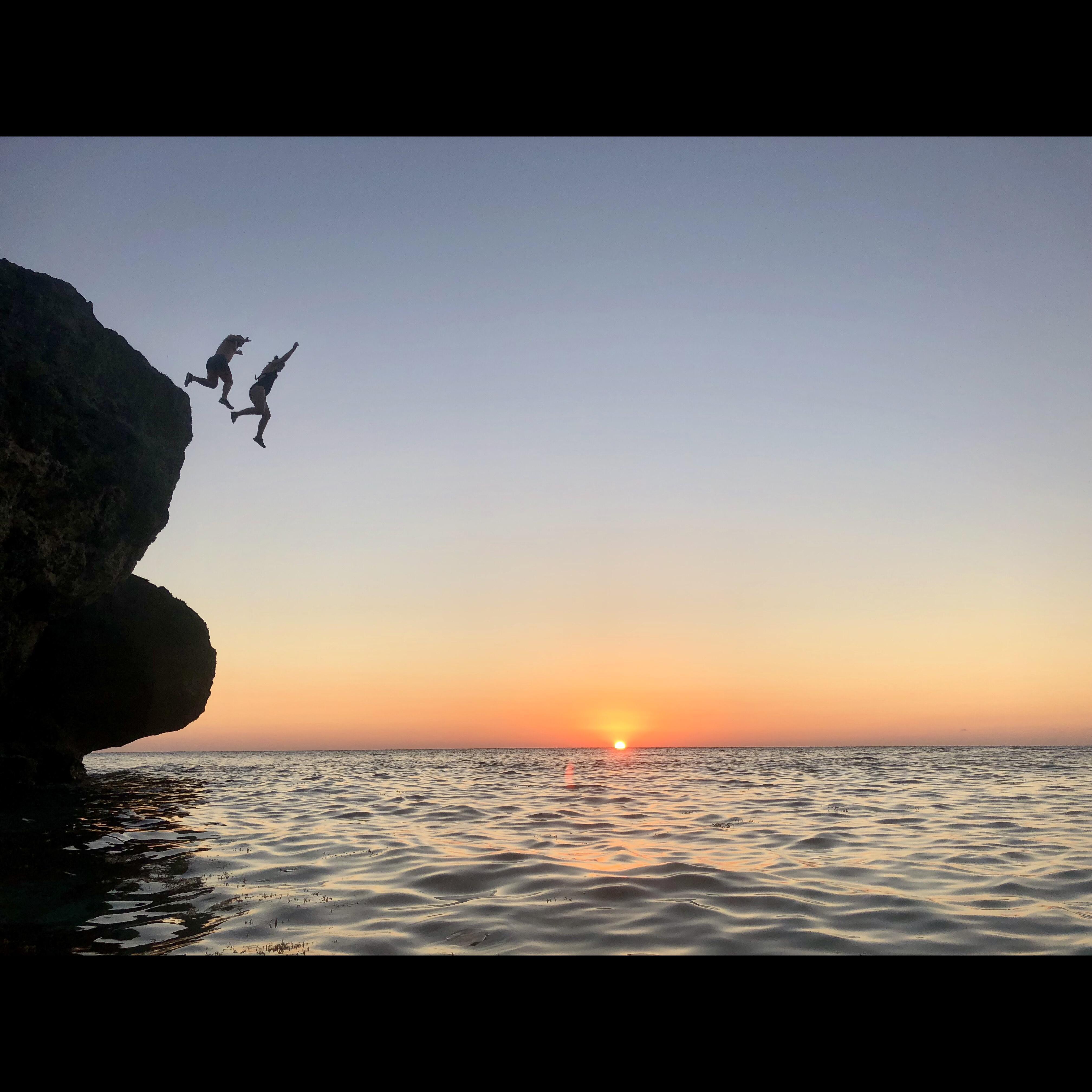 Cliff jumping in Jamaica - it took about 30 minutes to convince Emilie to jump!