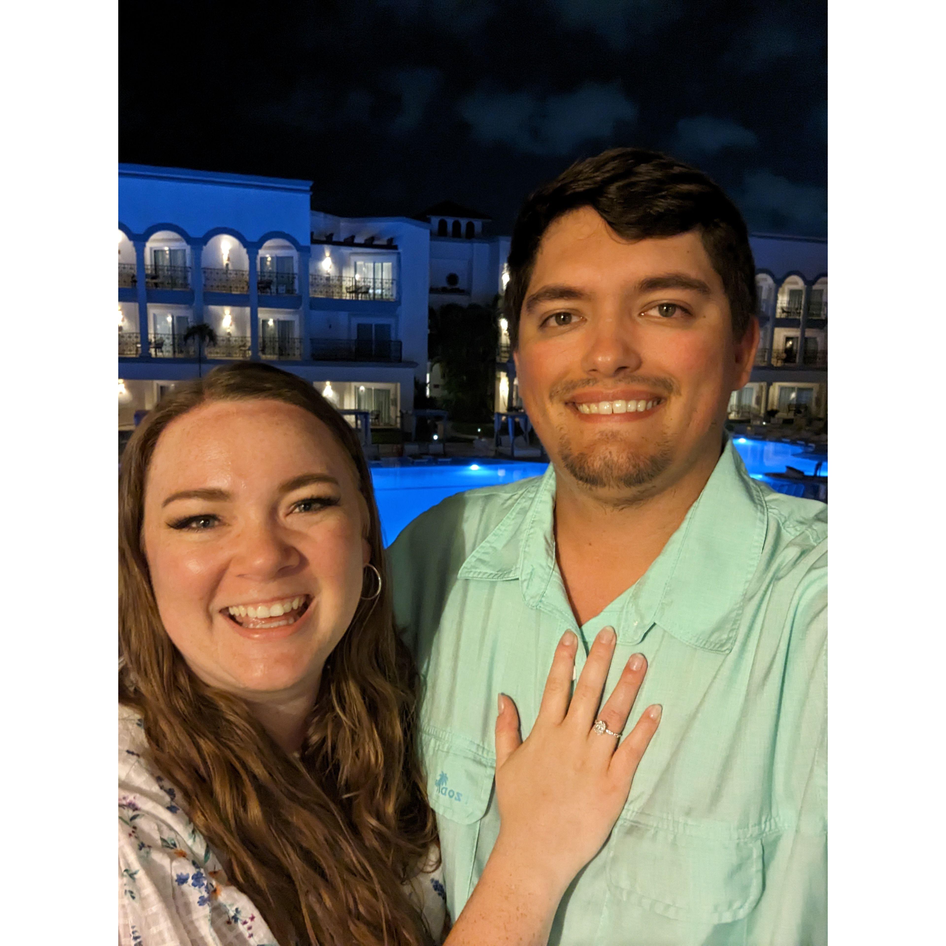 Tori and Tom on the balcony of their hotel room immediately following the proposal.