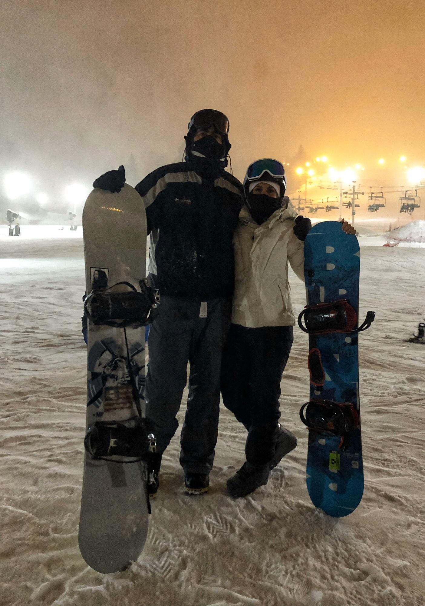 Night snowboarding in a snow storm.