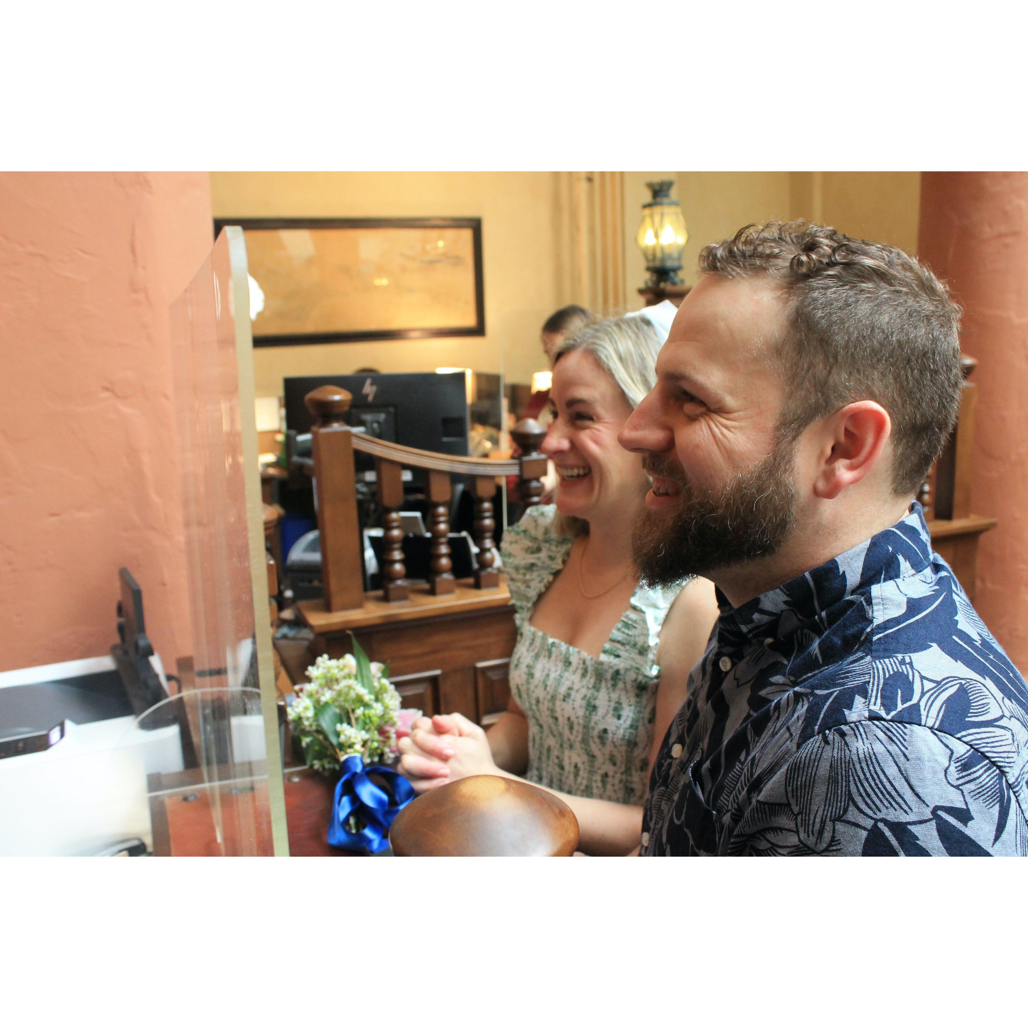 At the counter, getting married by the clerk in Santa Barbara