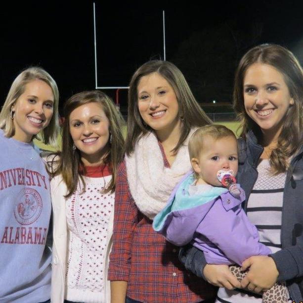 Madison with three of her bridesmaids and her flower girl.