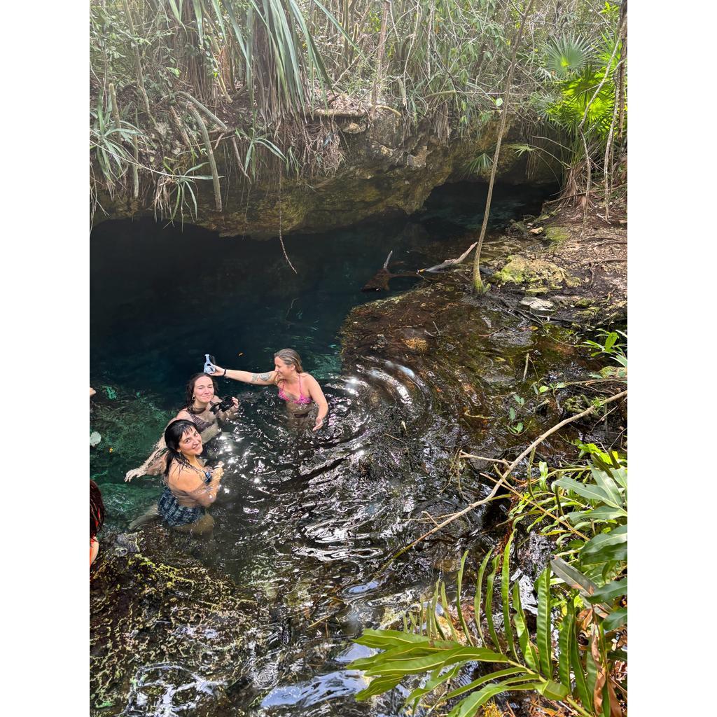 Swimmin at a cenote in Tulum, Mexico 2024