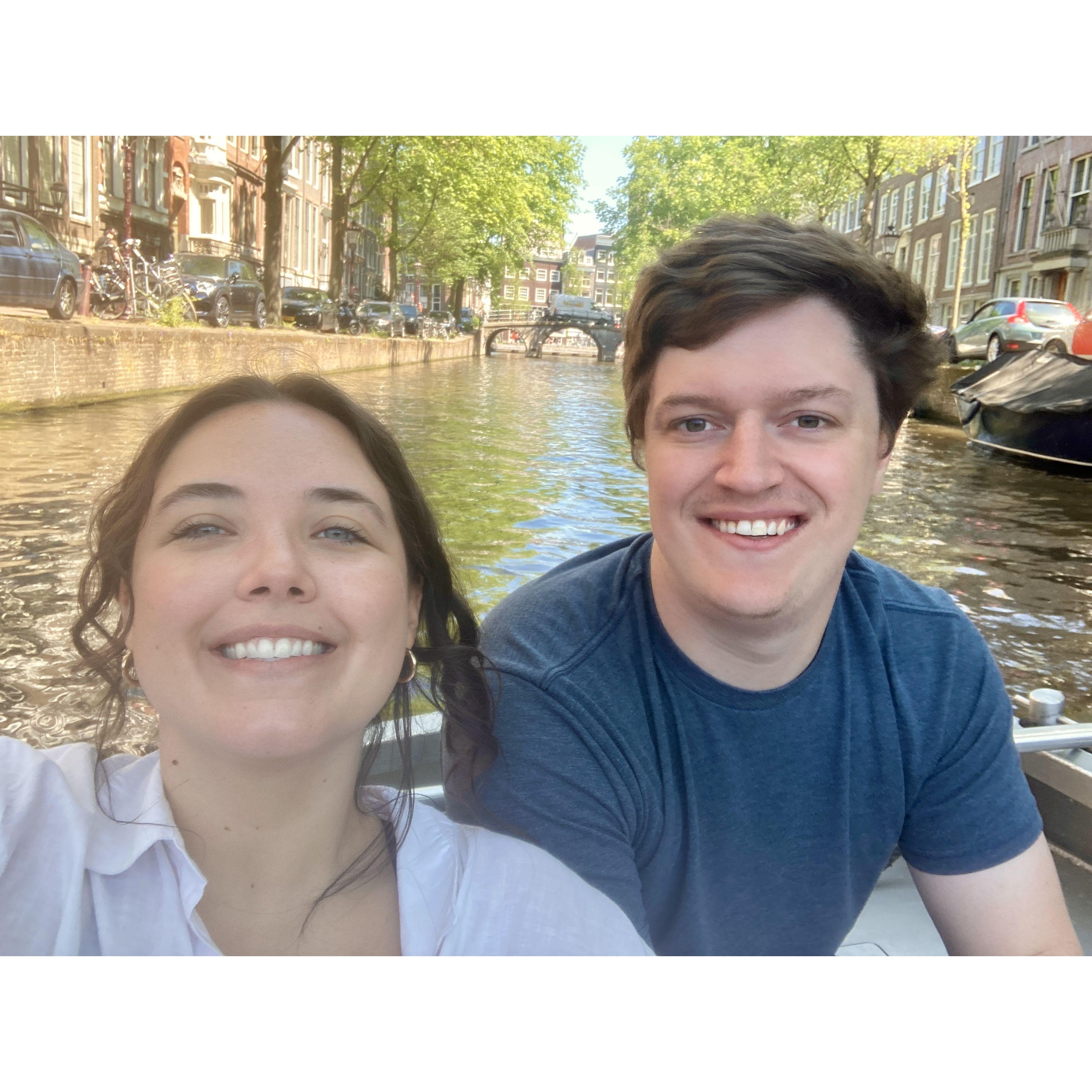 Joe navigating our private boat ride in the canals of Amsterdam! (2022)