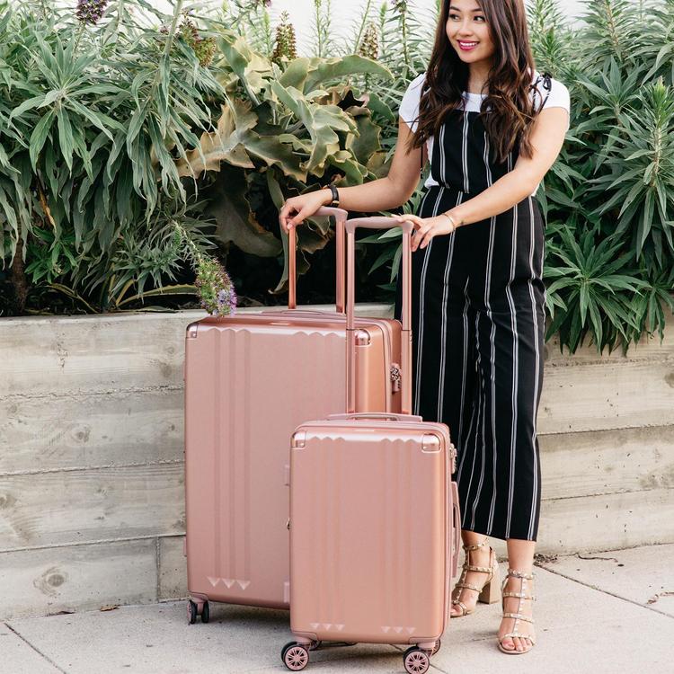 Calpak rose store gold luggage