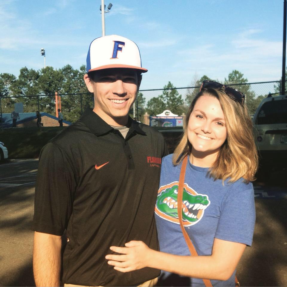 Cheering on the Gators, when Adam worked for UF Softball in April 2015