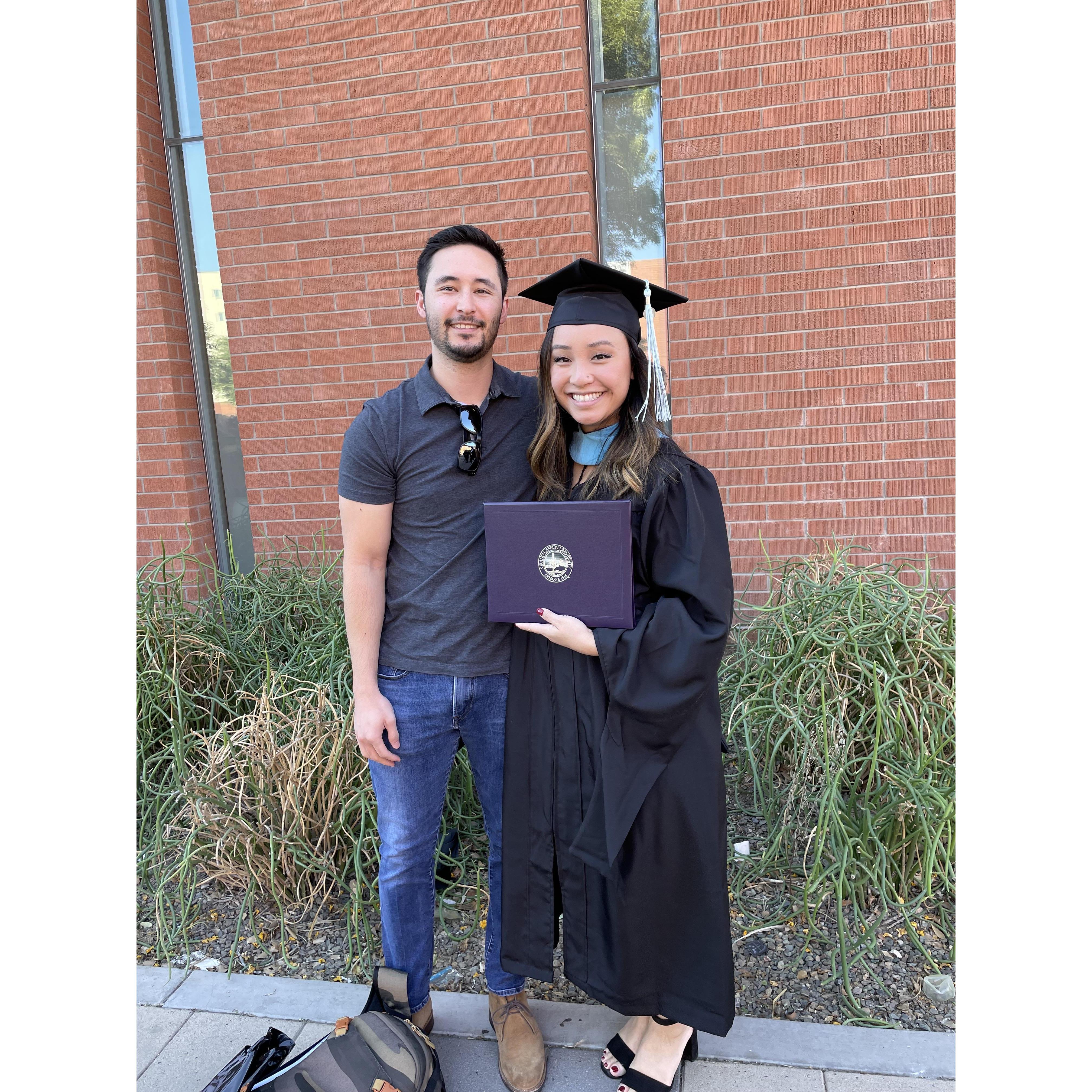 Barbie graduating with her Masters.