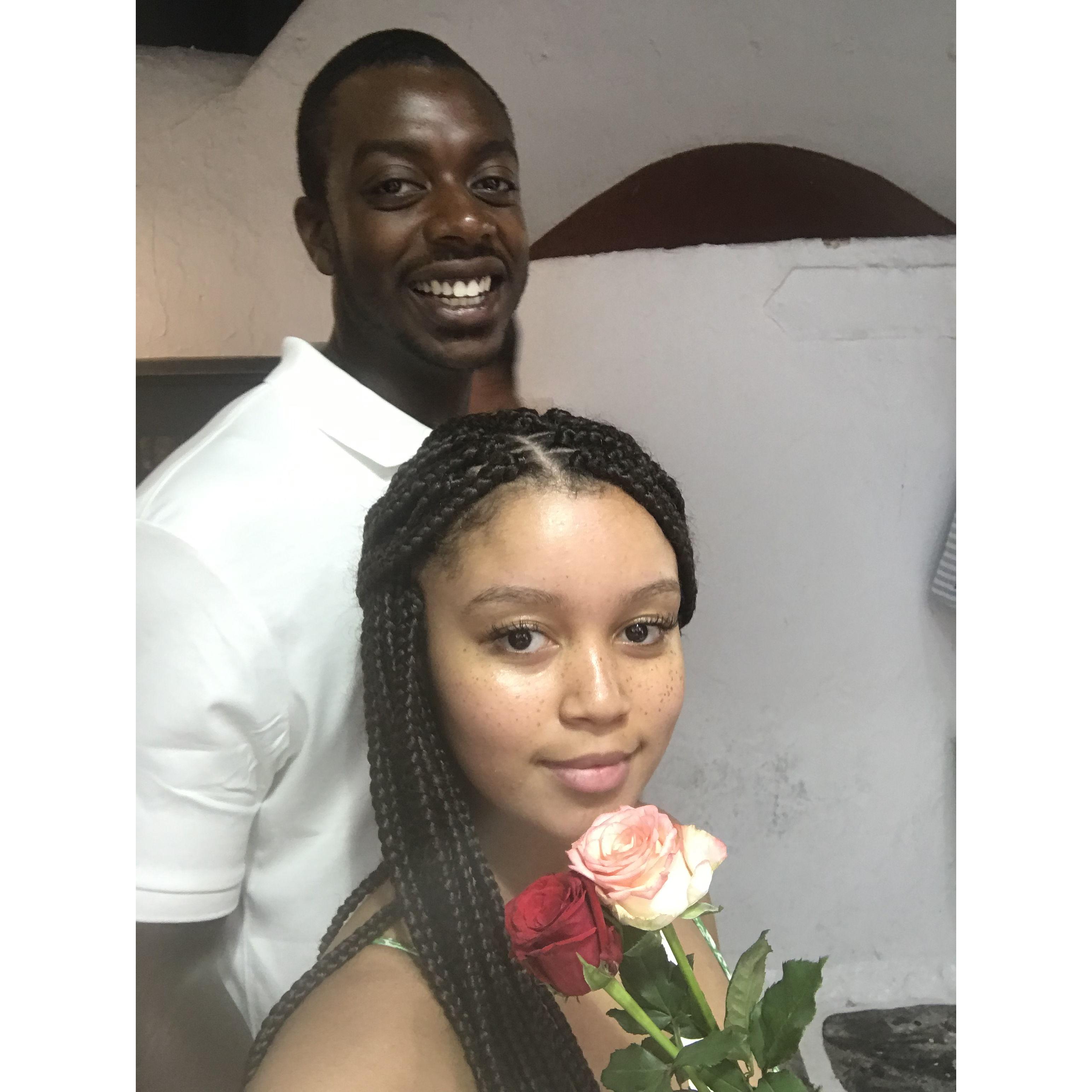 Us in Mykonos after Christian spontaneously bought Alexus flowers from a street vendor.