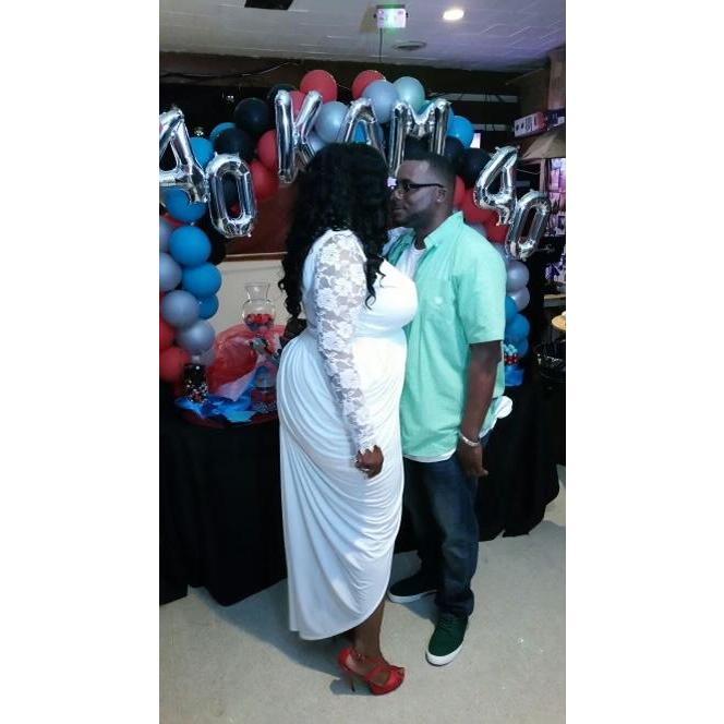 Us celebrating my 40th birthday party with family and friends