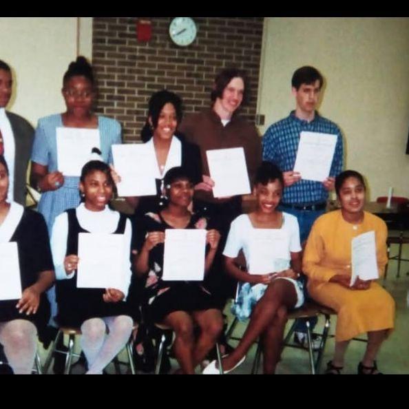 Circa 1997 - We are standing near each other as we are inducted into the National Honor Society together.  (10th grade)