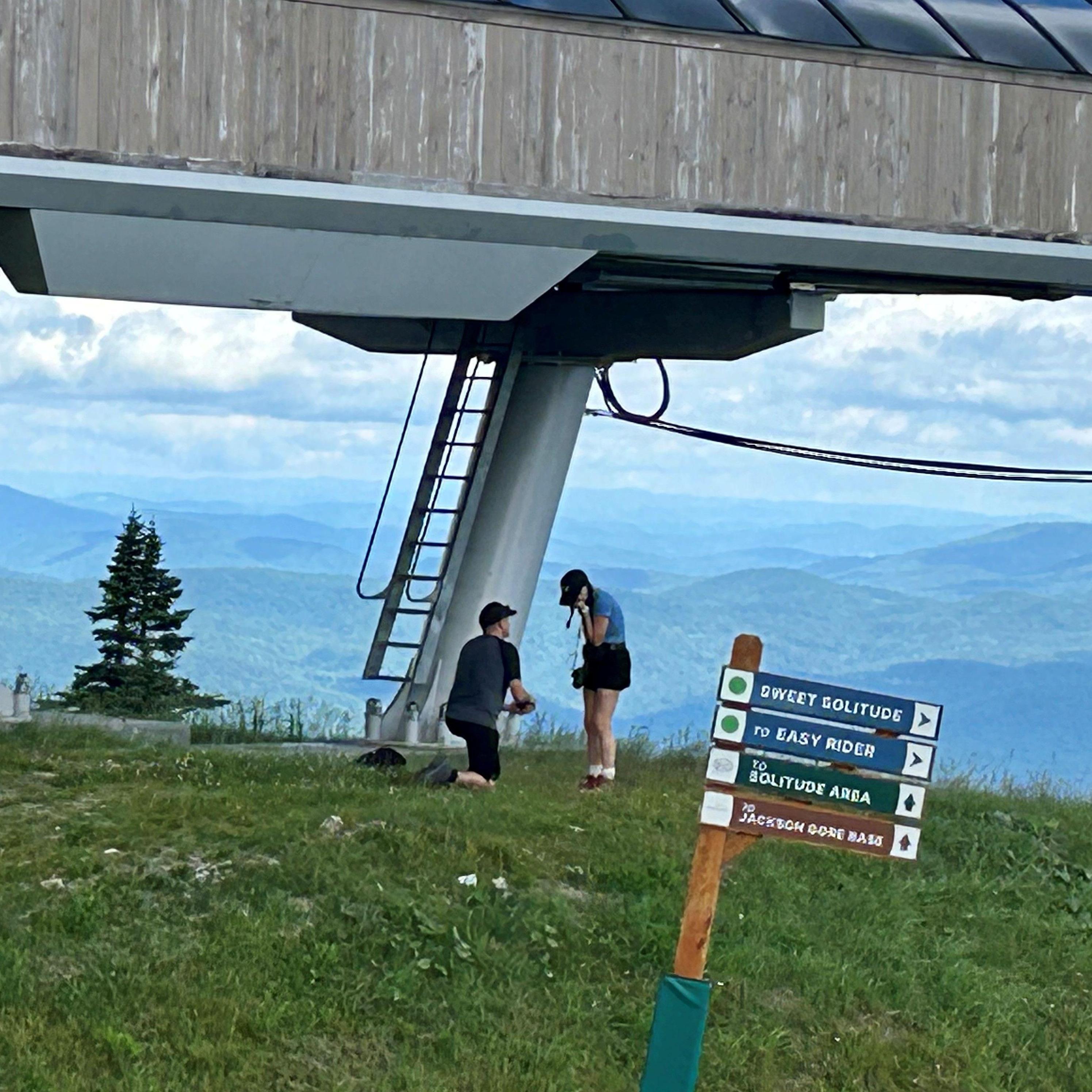 Adam surprised Laura by proposing on their hike on top of Okemo Mountain.