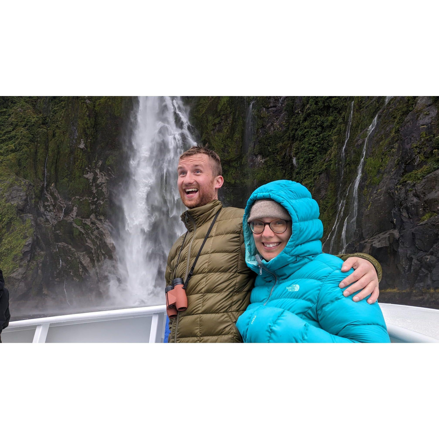Cosying up to the waterfalls in the Milford Sound, NZ.