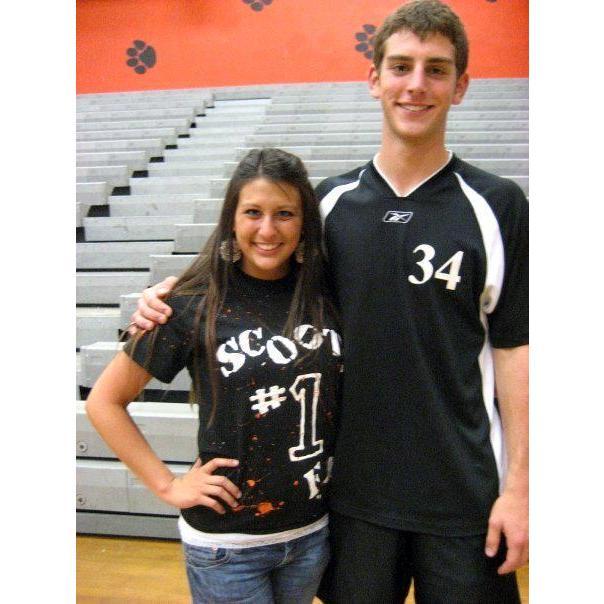 Alex made Scott a shirt with “Scoot’s #1 Fan” written on it for Volleyball Senior Night.