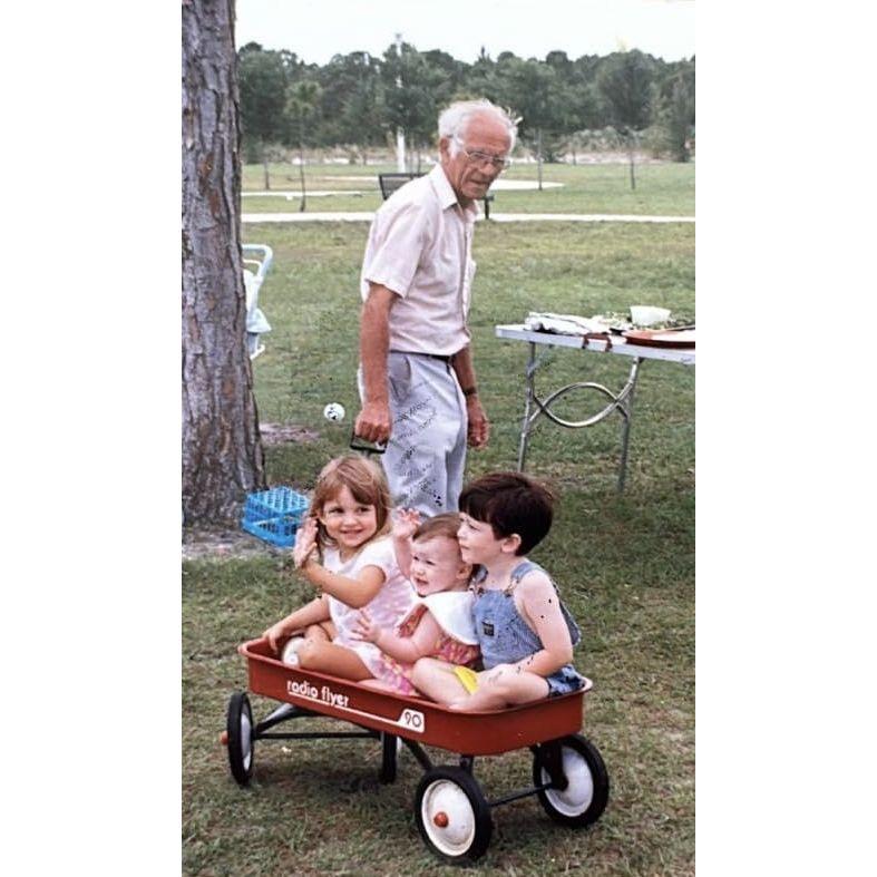 "Paw Paw" towing around the cousins, Madison, Meghan and Joey