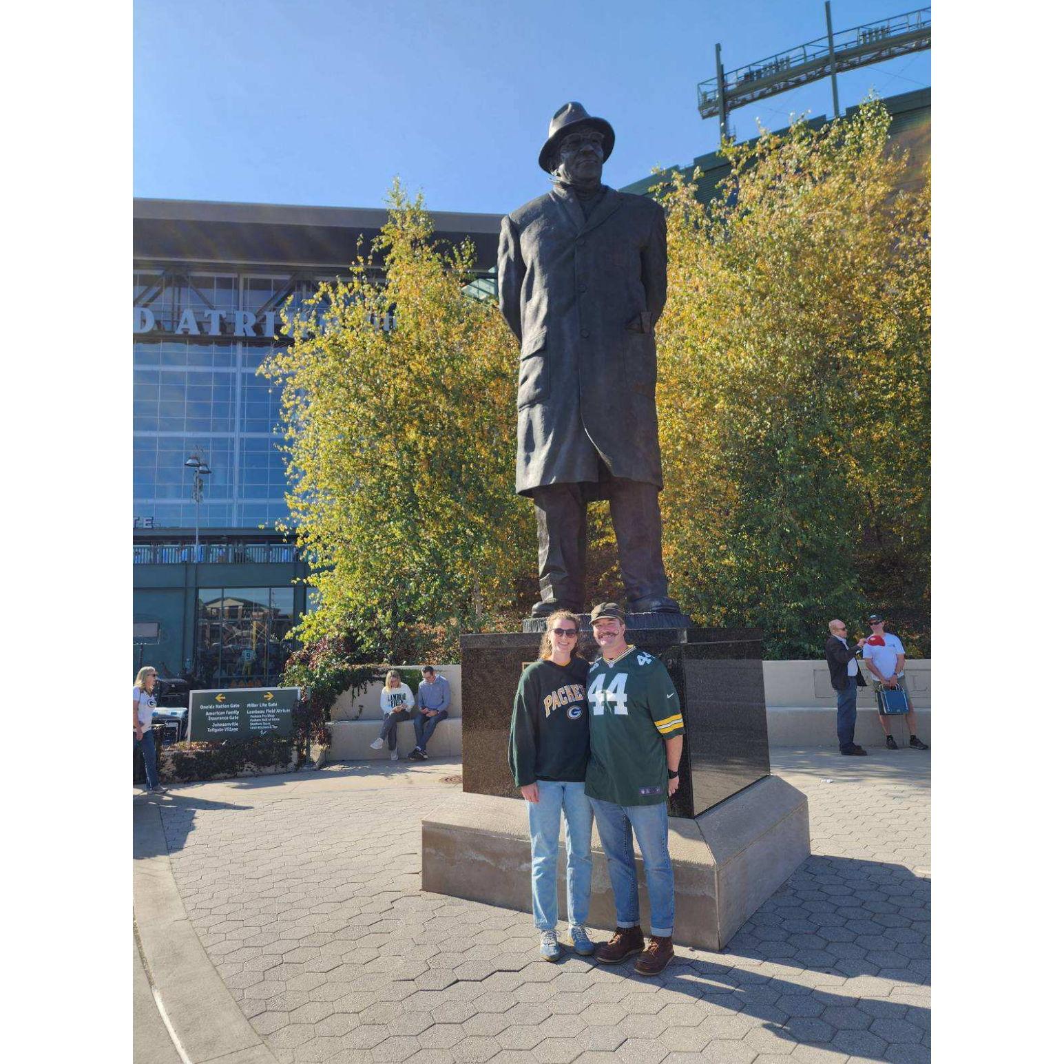 John took Abby to her first Packer game and paid respects to Vince