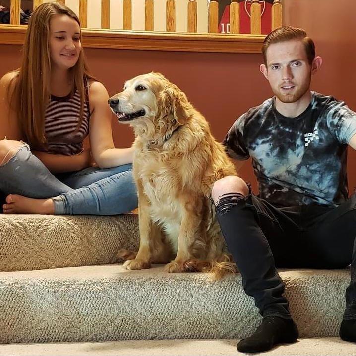 Sitting with Reece, Josephs childhood dog