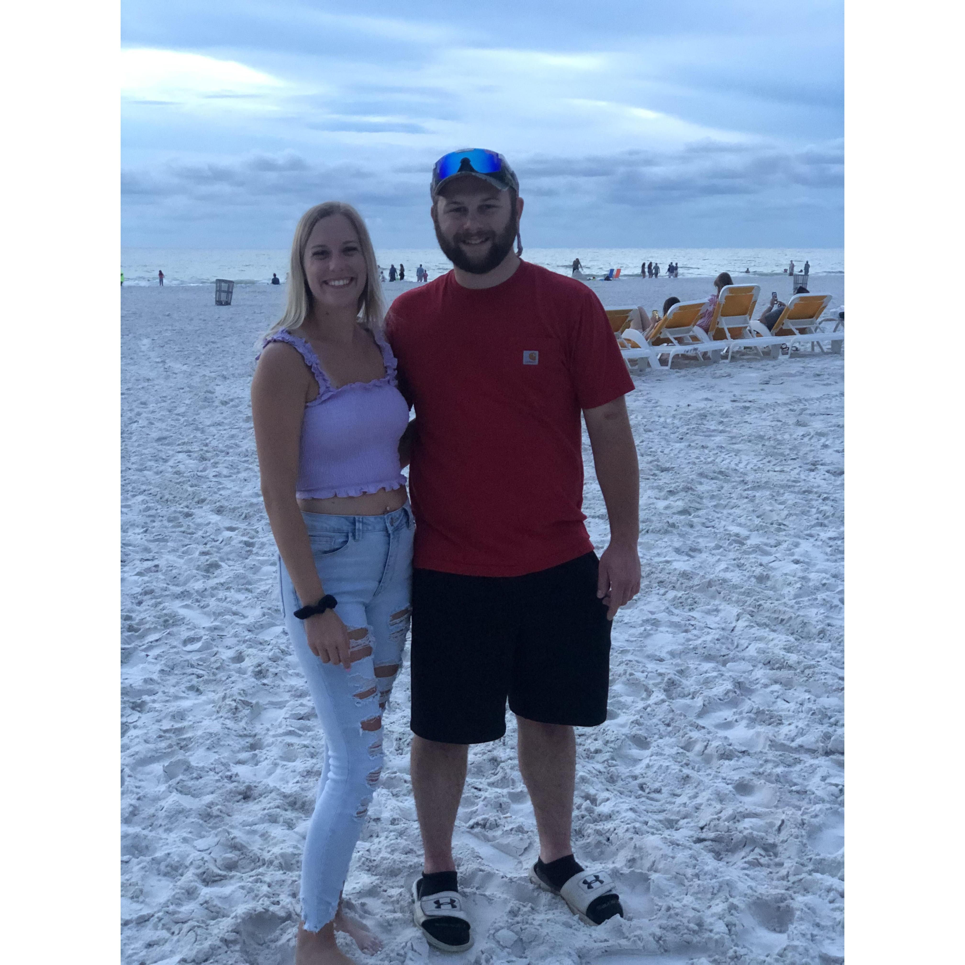 Clearwater Beach, FL. Our first vacation together. Please ask us about the airplane ride home.