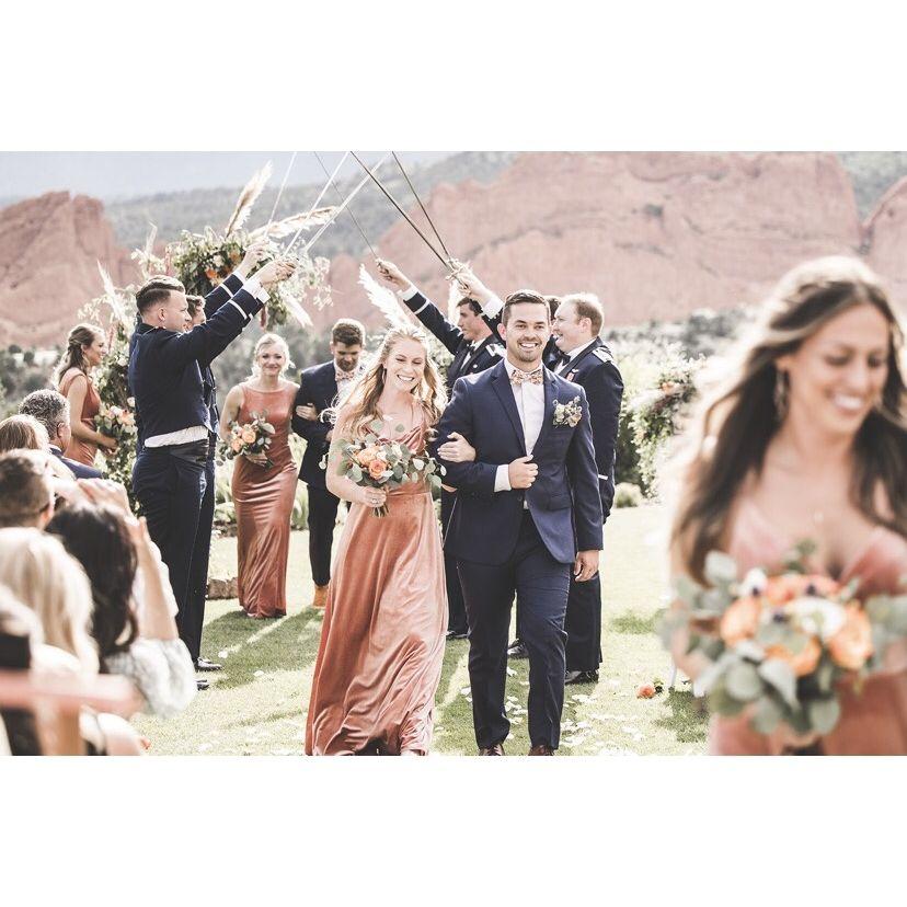 A couple weeks later, Brad (just being nice, NOT flirting whatsoever) sent Moira a couple of pictures of them walking down the aisle. (example of said photo, he was totally flirting -Moira)
