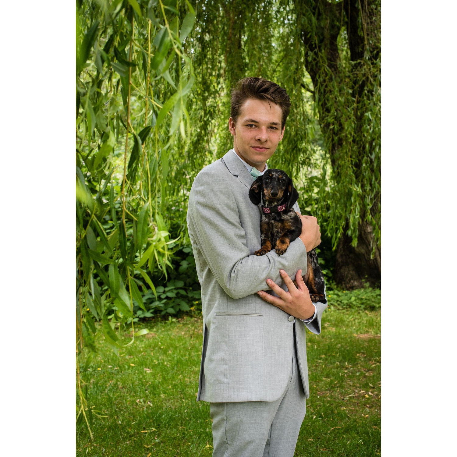 2019 - Micah posing with his favourite dog in the whole world