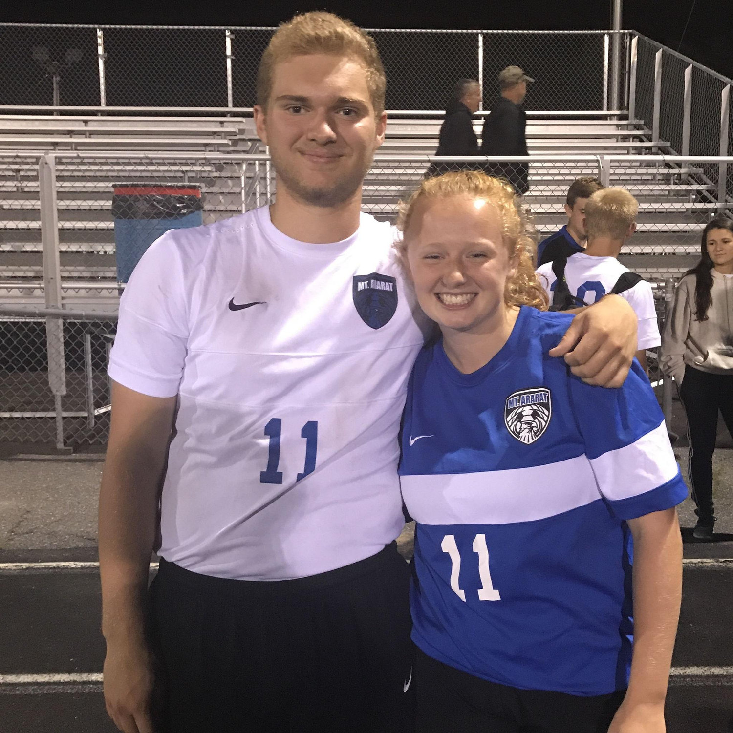 Our first photo together. Thanks for orchestrating the jersey swap, Brandi!