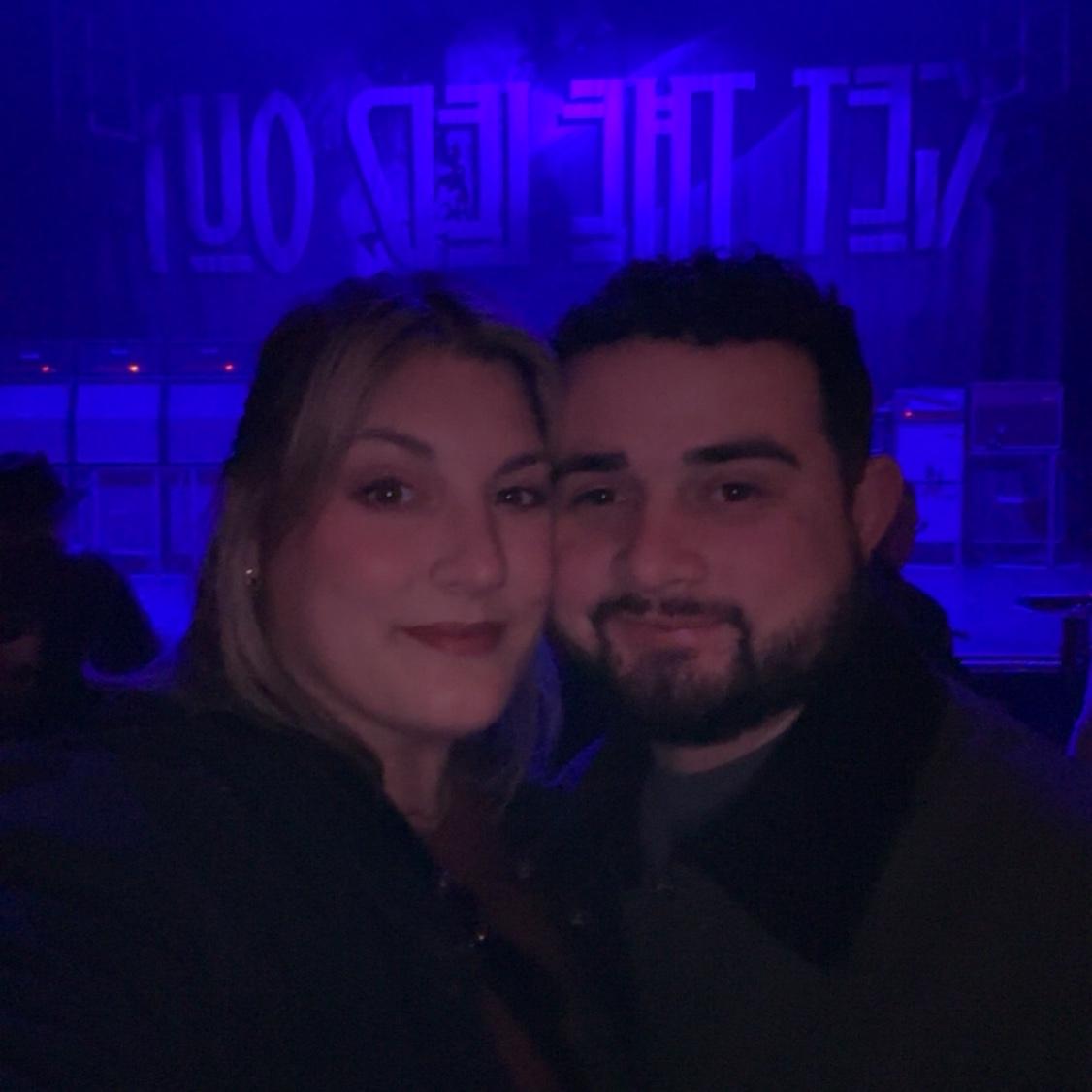 We bonded over our love of good music! Here is a photo of us at a Led Zeppelin cover band concert.