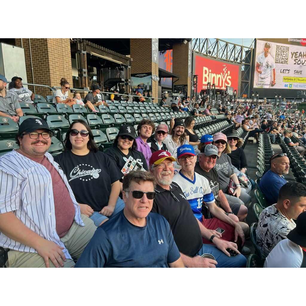 Claire's family cheering for (crying over?)  the White Sox