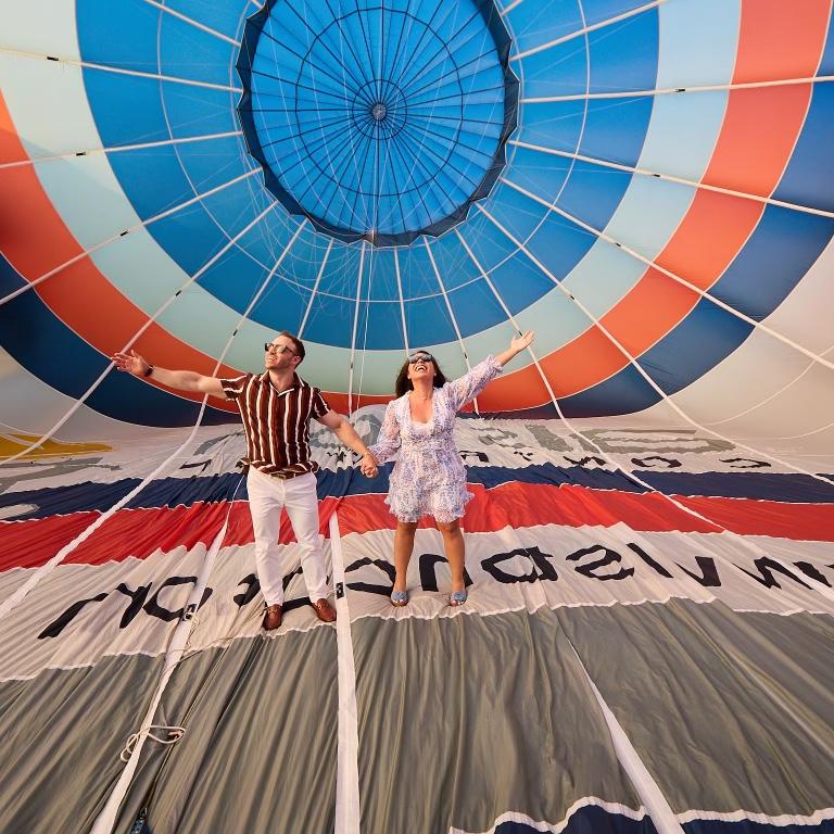 Todd tells Vanessa they’re going on a hot air balloon ride! What a cool experience to stand inside a massive balloon!
